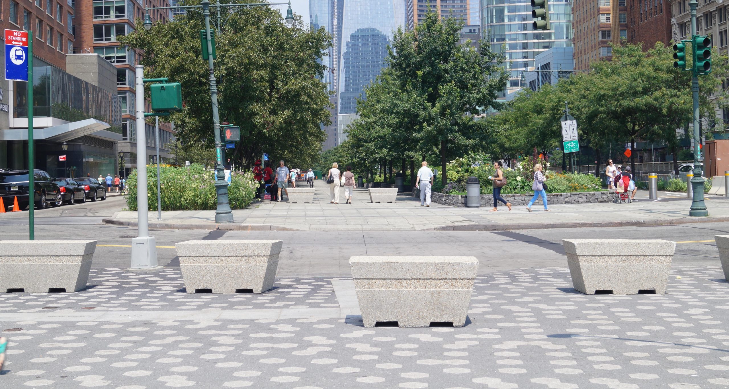 concrete bollards on sidewalk