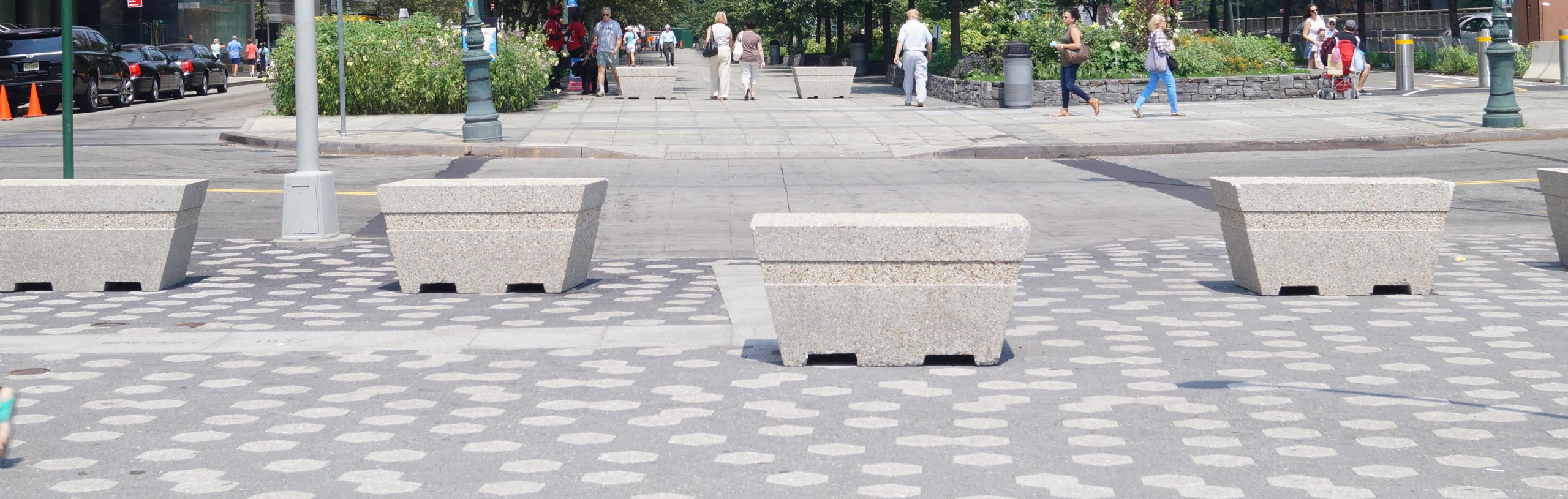 concrete bollards on sidewalk